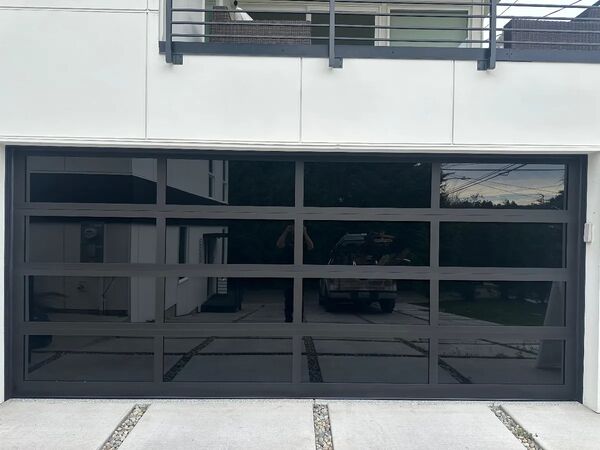 Modern Glass garage door installed in Jacksonville, FL